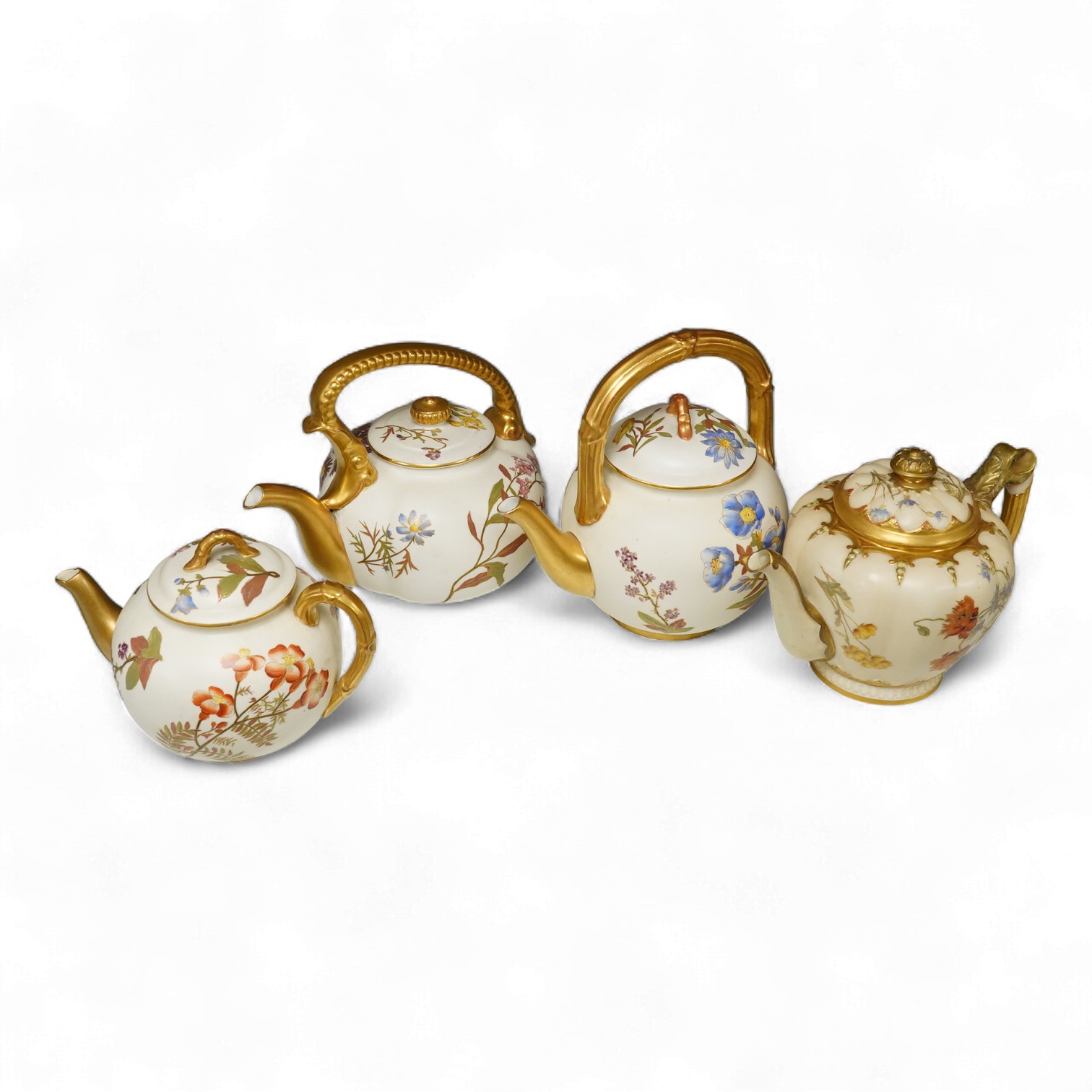 Four 19th century Worcester blush ivory teapots, with floral decoration and decorative handles, largest 20cm wide